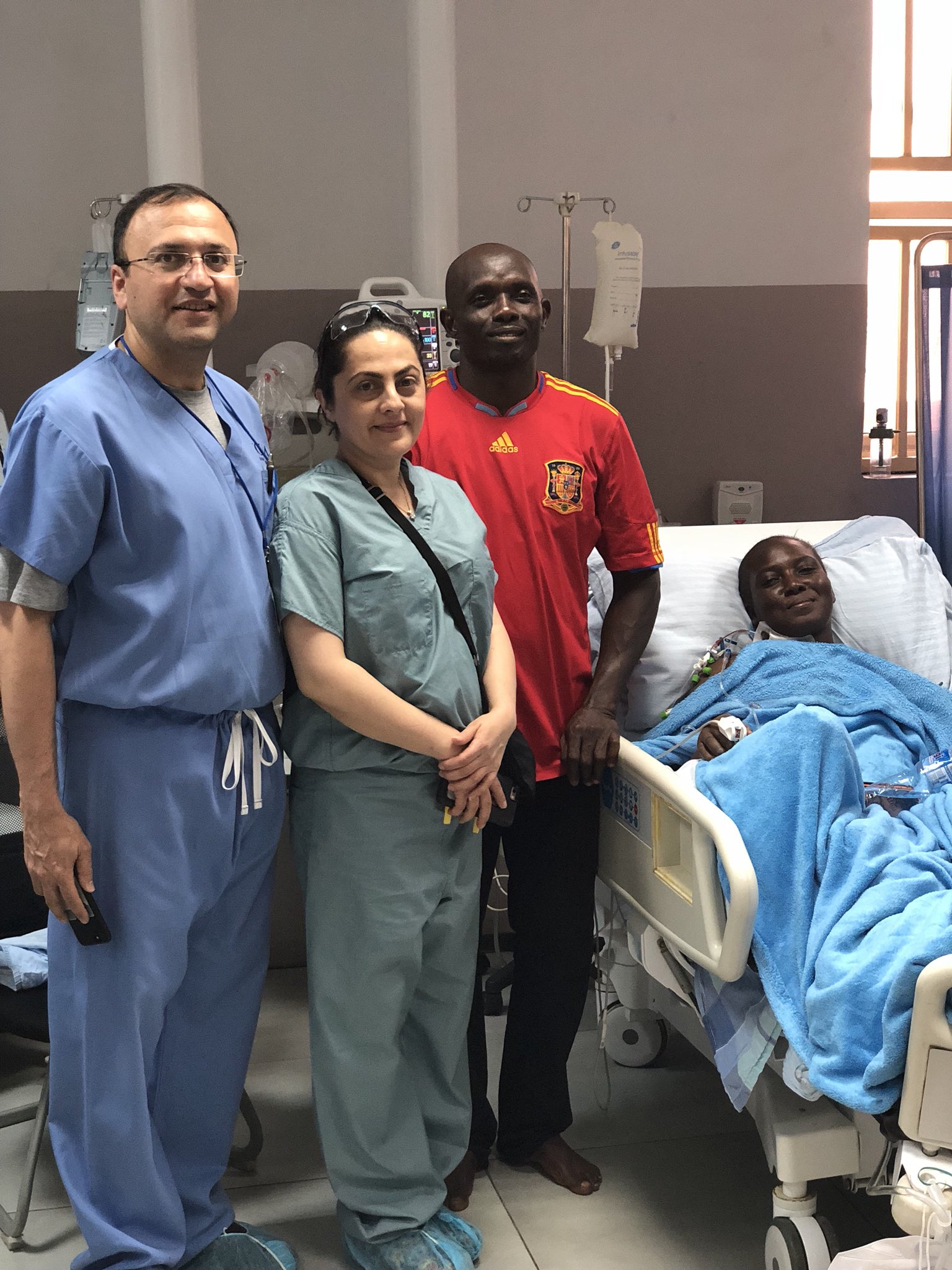 Medical professionals performing vascular procedure